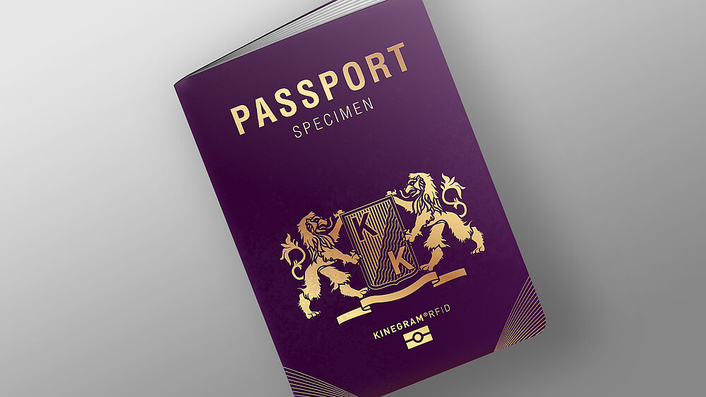 Gold foil for passport booklet covers can include hidden security features. Image of passport cover booklet with gold foil including nanotext