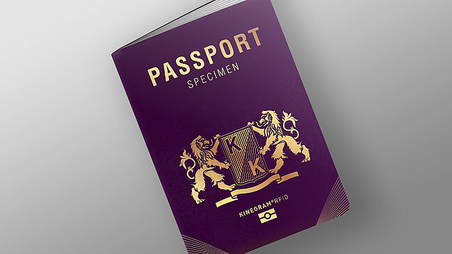 Gold foil for passport booklet covers can include hidden security features. Image of passport cover booklet with gold foil including nanotext