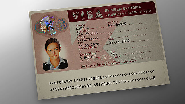KINEGRAM PRIME security patch for visa stickers Image of KINEGRAM sample security patch for protecting visa stickers showing a circular design combining metallized and printed lines