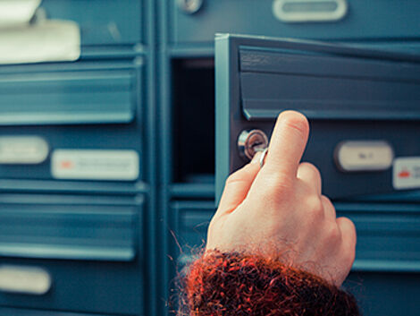 Incident Reporting in Writing A hand that turns a key to open a letterbox