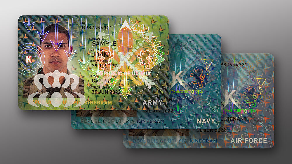 Sample military ID cards with a thinfilm security overlay (KINEGRAM TKO or KINEGRAM GUARD) for strong ID security Image of sample military ID cards with KINEGRAM thinfilm security overlays for strong ID security