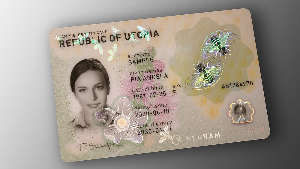 Strong ID protection with an embedded KINEGRAM with Full Data Protection (FDP) - "BEE" designEmbedded KINEGRAM with Full Data Protection (FDP) - design BEE Image of polycarbonate ID card with embedded KINEGRAM security feature showing a bee design, for strong ID protection