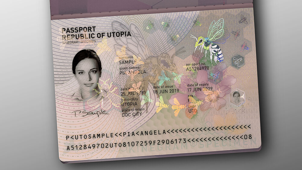 Passport Protection with the KINEGRAM - clever integration of the full-surface feature and the document print results in a harmonious design. The story:"THE FLIGHT OF THE BEES" Passport security by clever integration of the full-surface feature and the document print, which results in a harmonious security design.