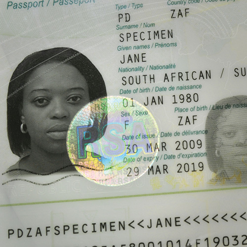 A transparent KINEGRAM PCI protects the portrait in the South African passport. Image of South African Passport, which is secured by a KINEGRAM PCI.